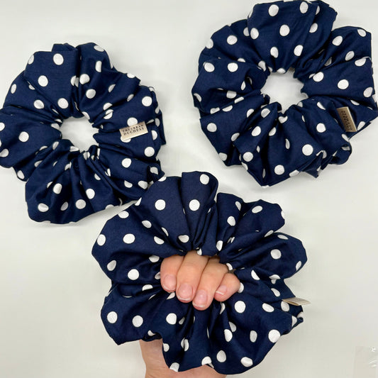 Blackberry Dot oversized polka‑dot scrunchies. Rich deep navy blue with white polka dots, 100% cotton fabric, handmade in Kent, UK, cottagecore hair accessory, ideal everyday wear & gift for her