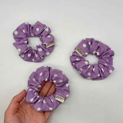 Lavender Dot Mini polka dot scrunchies. Soft lavender purple with white polka dot design, 100% cotton fabric, handmade in Kent, handmade in the UK, boho cottagecore hair accessory, ideal everyday wear & gift for her