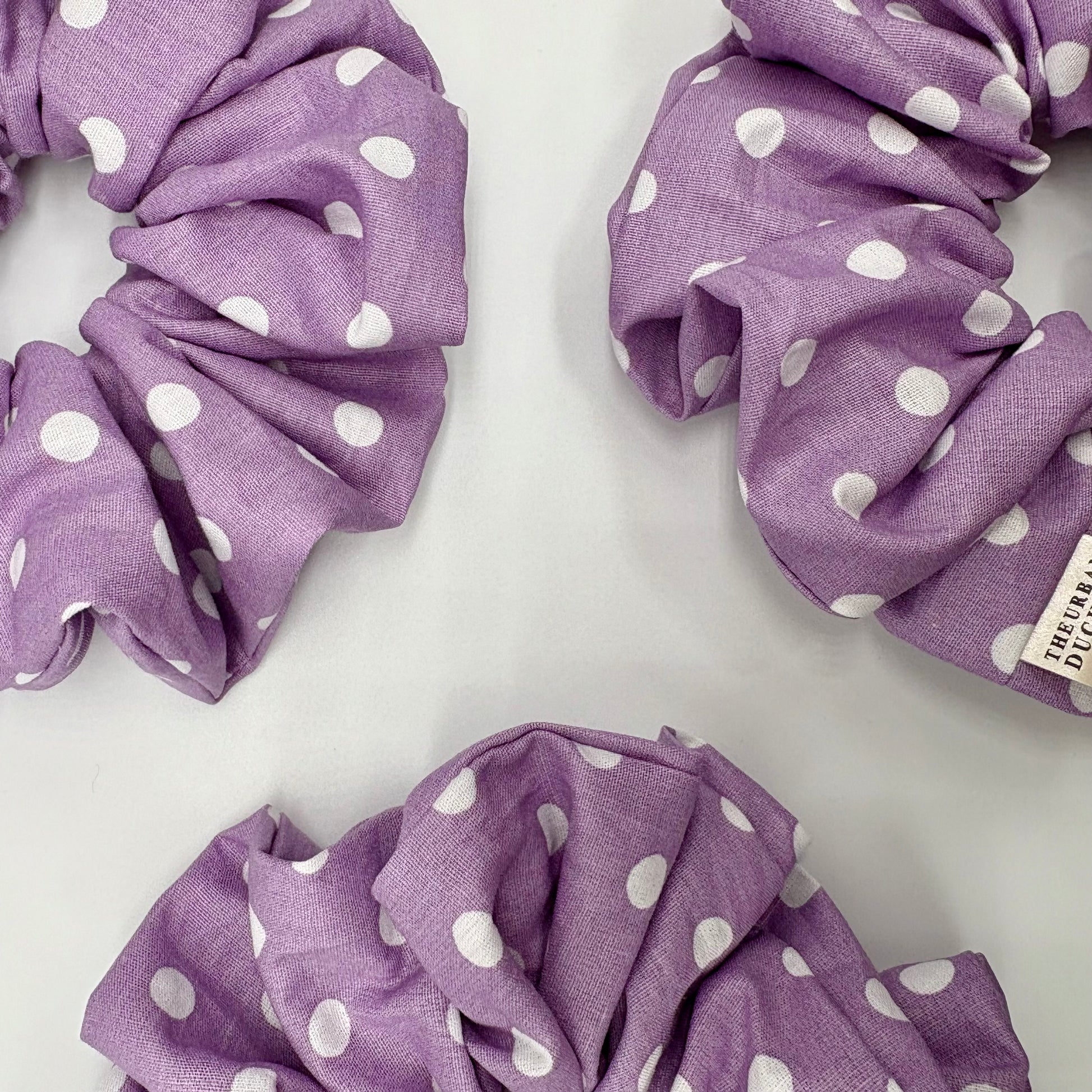 Lavender Dot oversized cotton scrunchie. Dreamy lavender purple with crisp white polka dots, 100% premium cotton, handmade in Kent, handmade in the UK, gentle on all hair types, cottagecore style