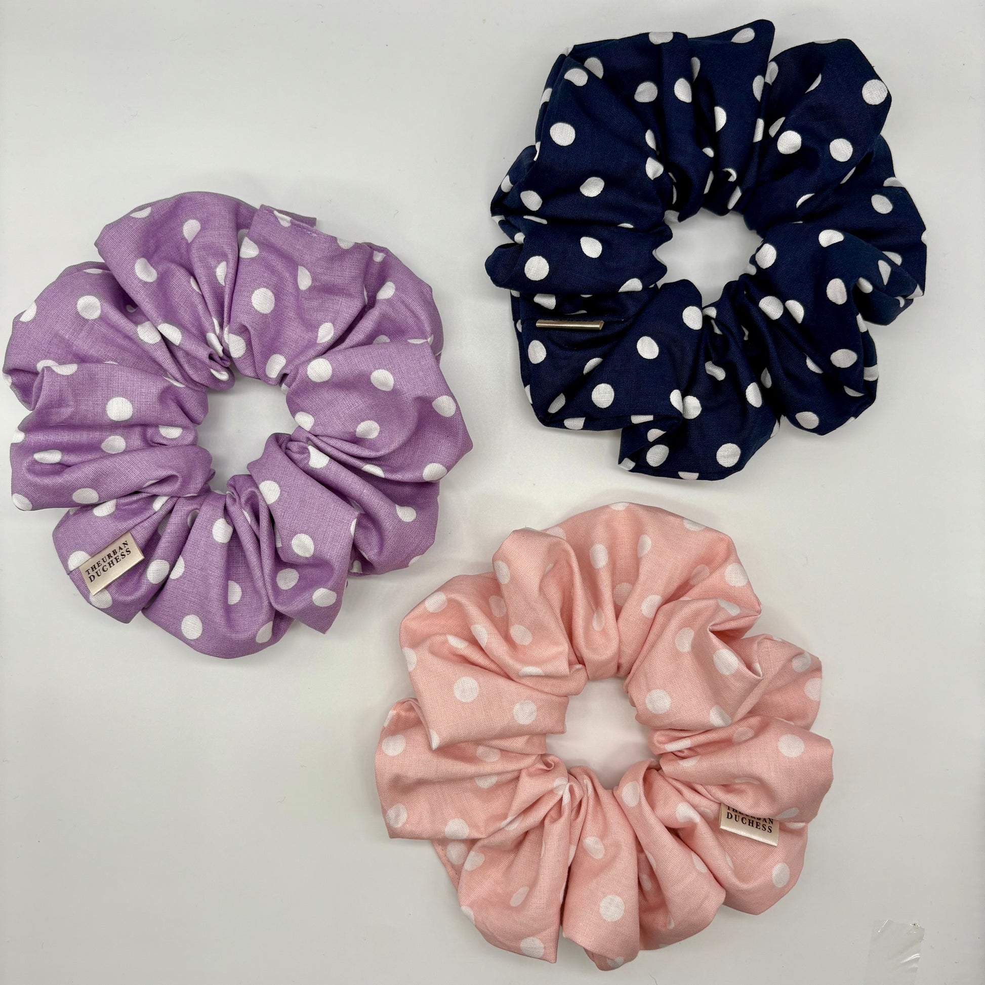 Blush Dot, Berry Dot, Lavender Dot oversized scrunchies. Blush pink, navy blue, lavender purple polka‑dot designs, 100% cotton fabrics, handmade in Kent UK, handmade hair accessories