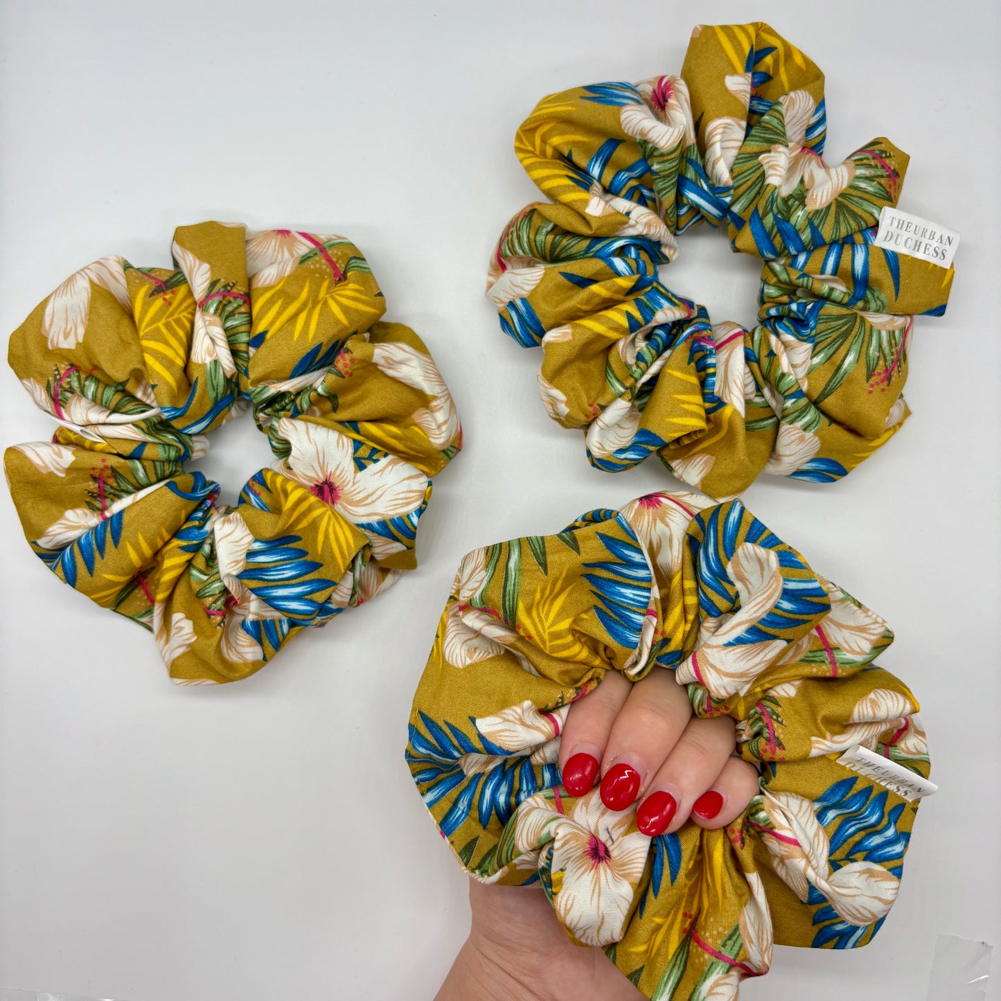 Hibiscus Sun oversized scrunchie made from 100% cotton fabric. Vibrant tropical hibiscus print, handmade in Kent UK, perfect for summer styling and gifting.